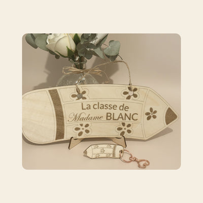 Plaque de porte en forme de crayon